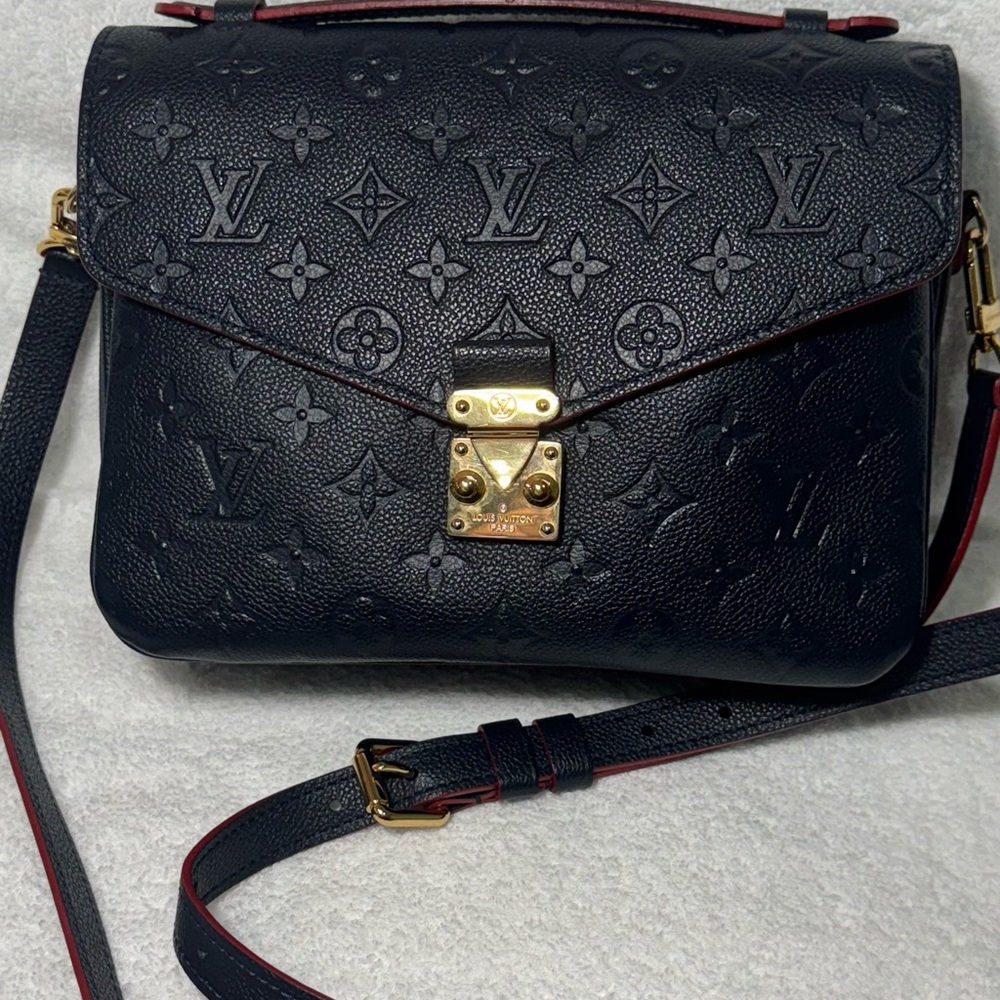 Used Louis Vuitton Navy Crossbody Bag Embossed Monogram Pattern and Gold Clasp